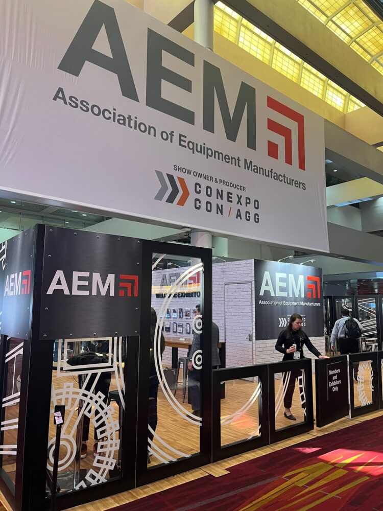 The AEM campaign tells the stories of three of the 2.3 million Americans in the equipment manufacturing industry. Pictured is the AEM stand at CONEXPO-CON/AGG 2023. Image/AEM
